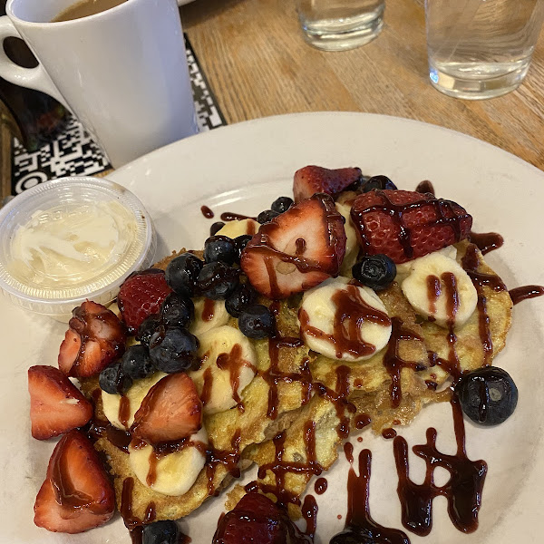 Gluten free berry french toast. Cream cheese icung on the side.