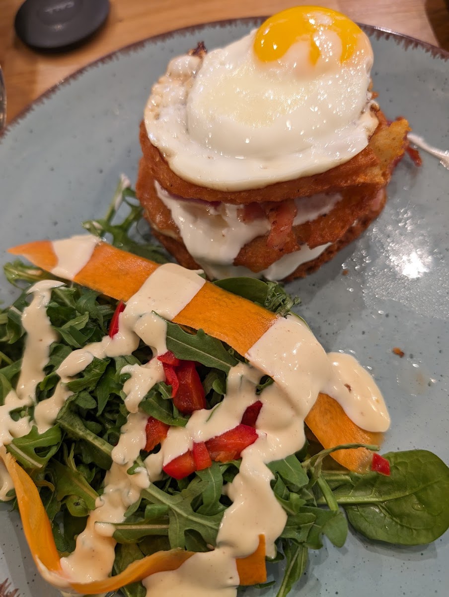 hash browns with bacon, egg and salad