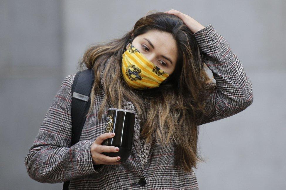 A pedestrians wears a face masks to prevent the spread of coronavirus in New York City on Monday, November 16, 2020. Coping with the global COVID-19 health crisis has been exhausting and stressful, and many Americans are experiencing pandemic fatigue. Photo by John Angelillo/UPI