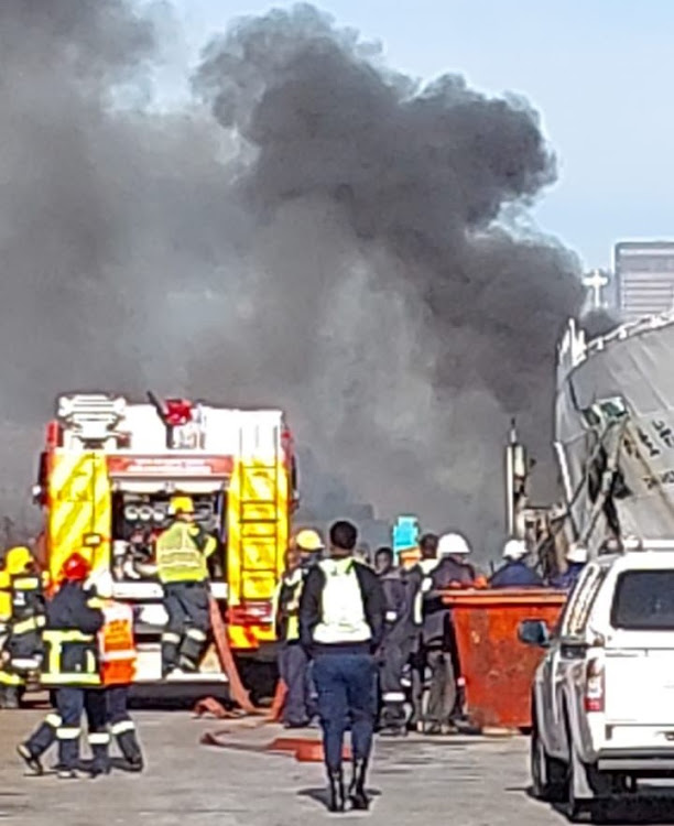 A partly scrapped ship caught fire at Cape Town harbour on May 10 2022.