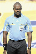 DESERVING
      : Assistant referee Zakhele Siwela