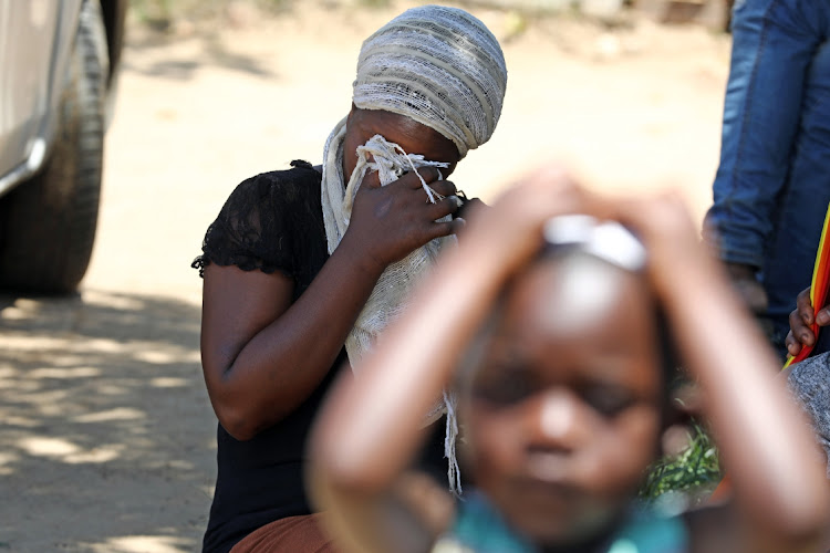 Naomi Kagwa is one of the residents who lost her belongings when 18 shacks burnt to the ground at Thabo Mbeki Village informal settlement near Lion Park, Johannesburg.