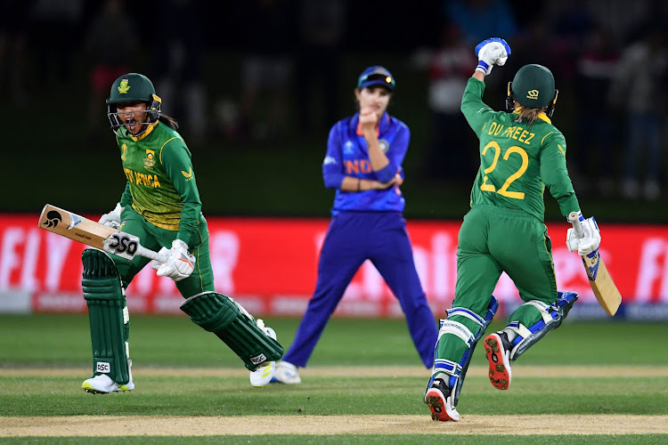 Player of the match Mignon du Preez celebrates after scoring the winning runs against India.