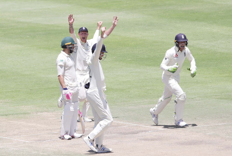 England players celebrates the wicket of Proteas captain Faf du Plessis during the last day of the test match at Newlands, Cape Town on January 07, 2019. Picture: