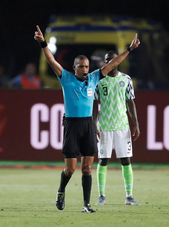 Referee Jiyed Redouane awards a goal to South Africa after a VAR review