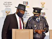 The bargaining council has upheld the dismissal of Maj-Gen Jeremy Vearey from the police service. Pictured are police minister Bheki Cele and police commissioner Khehla Sitole.