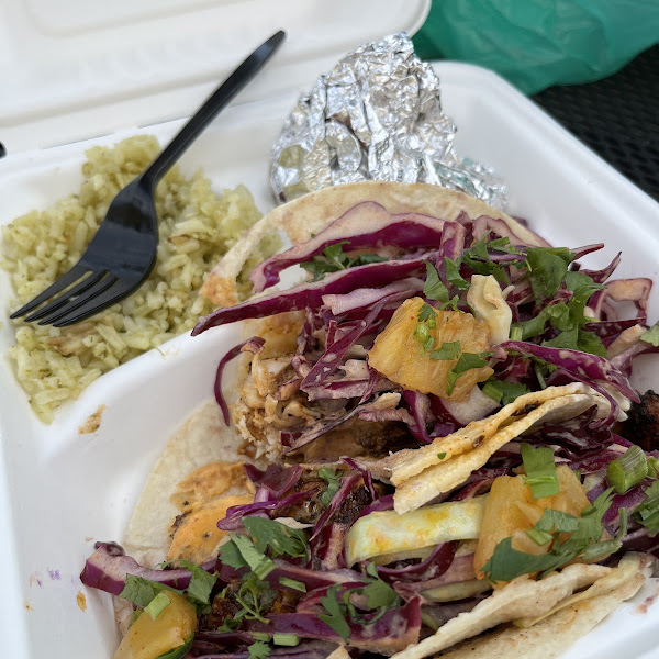 Blackened fish tacos with green rice and black beans