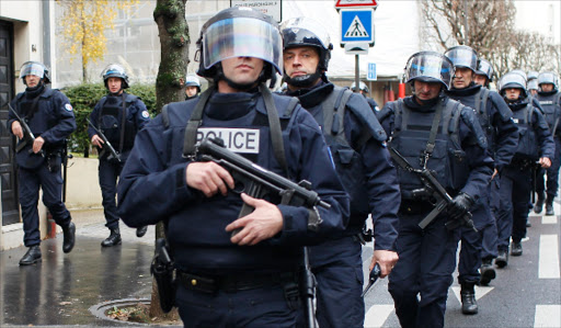 SAME SCRIPT: Police respond after two terrorists killed 12 staffers at Charlie Hebdo magazine in Paris last week. The tow have been killed. Photo/REUTERS