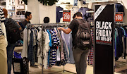 Shoppers hunt for Black Friday bargains at Rosebank Mall in Johannesburg in this November 25 2016 file photo.      Picture: FINANCIAL MAIL/FREDDY MAVUNDA