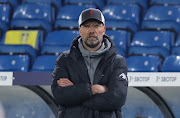 Juergen Klopp, Manager of Liverpool looks on during the Premier League match between Leeds United and Liverpool at Elland Road on April 19, 2021 in Leeds, England. 