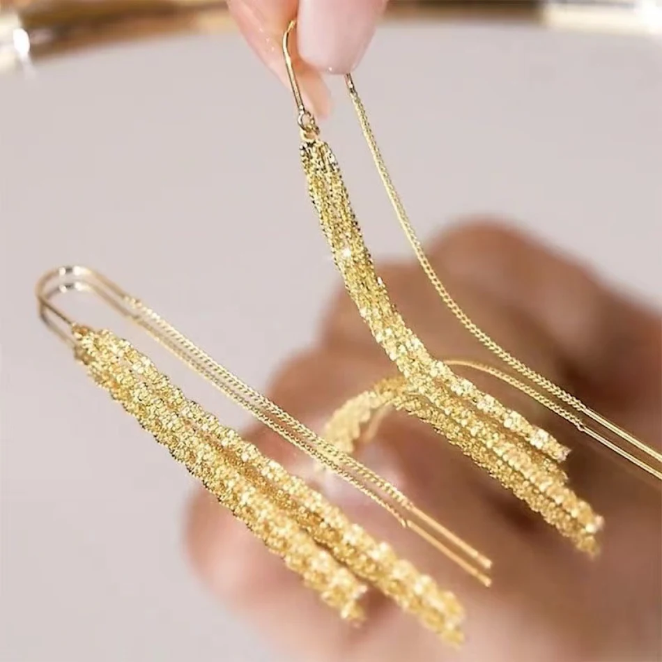 Boucles d'oreilles longues à franges étoilées pour femmes Anti-perte Élégance et sécurité Bijoux féminins Design unique et tendance