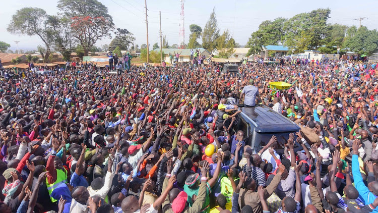 Deputy President William Ruto together with ANC party leader Musalia Mudavadi and Ford Kenya leader Moses Wetangula during a rally at Uchumi Kwanza, Posta Grounds, Bungoma County.