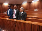 From left to right: Lesley Maluleke, former Gauteng Hawks head Shadrack Sibiya and former Hawks head Anwa Dramat at the High Court in Pretoria on October 8 2018. 