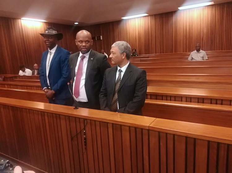 From left to right: Lesley Maluleke, former Gauteng Hawks head Shadrack Sibiya and former Hawks head Anwa Dramat at the High Court in Pretoria on October 8 2018.