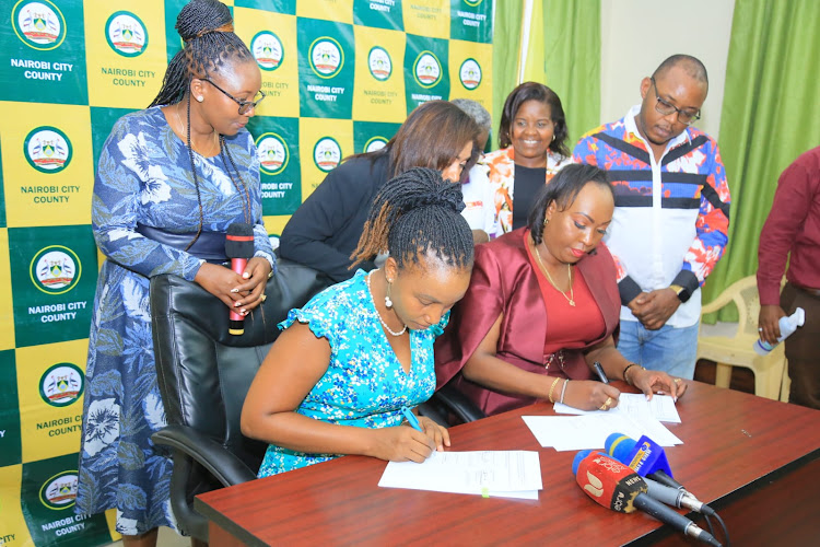 Nairobi Nominated MCA Wanjiku Kariuki, NGAAF Co-coordinator Charity Kanario. Nairobi Governor Ann Kananu and Karura MCA Joseph Wambugu during the signing of MoU to construct Sh88 million SGBV safe house on March 8, 2022