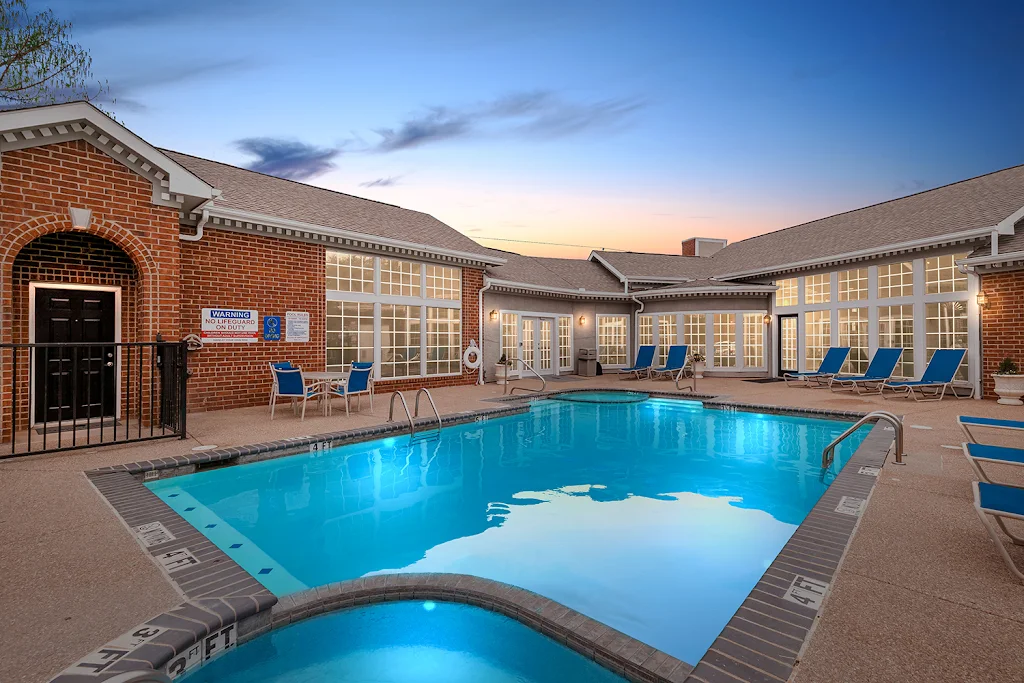 StoneBridge at Bear Creek apartment swimming pool at dusk