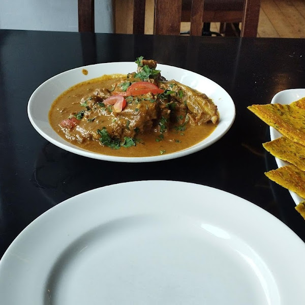 Lamb curry and graham flat bread