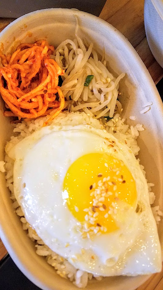 Kim Jong Smokehouse Soup with Rice and Ban-chan of kimchee, sesame sprouts, and spicy shredded daikon for brunch at Pine Street Market