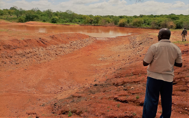 Kitui National Drought Management Authority coordinator, Francis Koma, at the Mbarani livelihood support and climate change resilience water dam in Katse ward of Mwingi North in Kitui on Thursday, January 20.