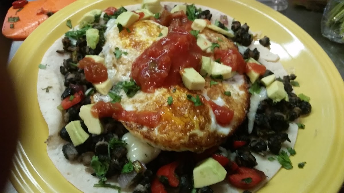 Huevos Rancheros on top of a Gluten Free Tortilla!! So yum, and packed with protein!!