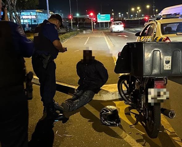 Getting a traffic violation fine was the start of the delivery biker's troubles.