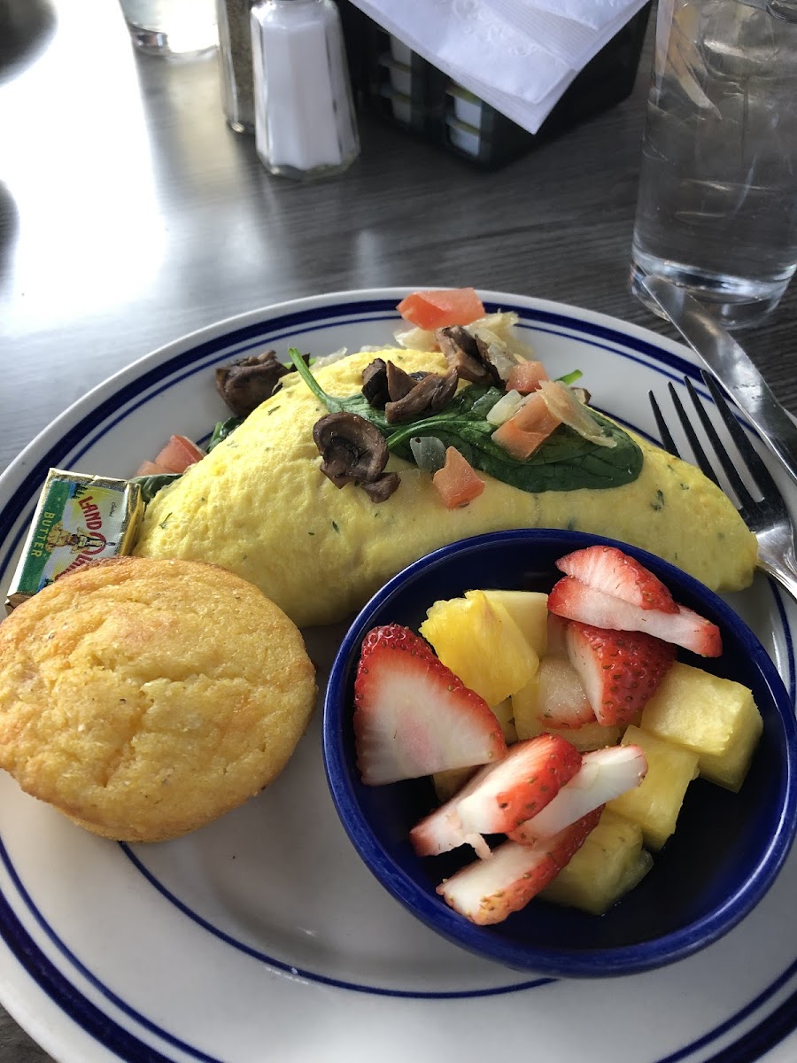 A dozen choices of omelettes or build your own.   Offered us gf corn bread muffin with flecks of jalapeño, for a safe side. Celiac kid also had a huge wedge of gf coffee cake - came warmed up.