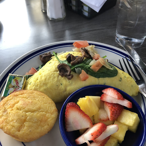 A dozen choices of omelettes or build your own.   Offered us gf corn bread muffin with flecks of jalapeño, for a safe side. Celiac kid also had a huge wedge of gf coffee cake - came warmed up.