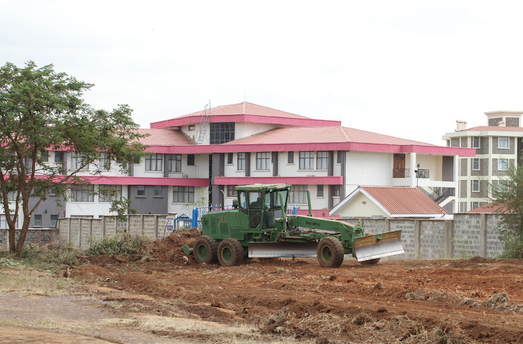 An NYS bulldozer flattens ground at the land in Kenyatta University on Wednesday