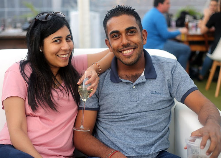 Nikita Raga and Prishen Ryan enjoyed after-work drinks at the Roof Garden Bar in Central on Friday evening