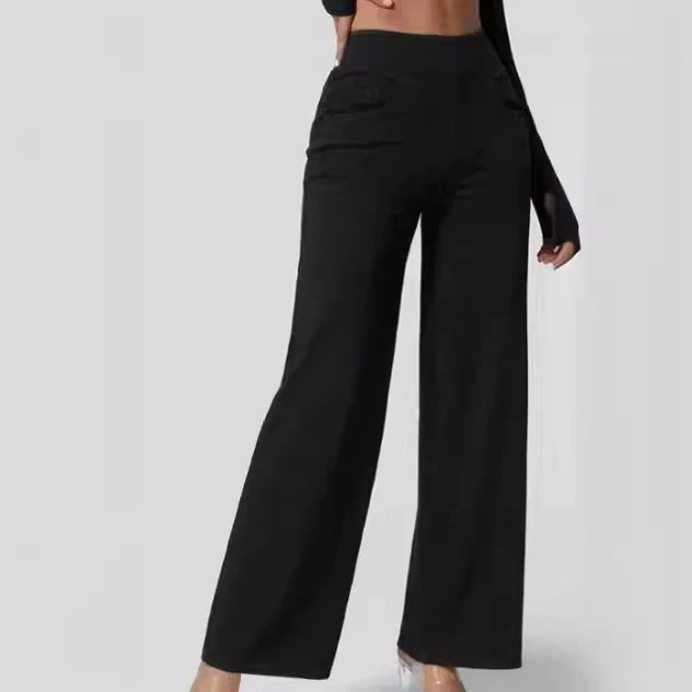 Pantalon large à jambe large et coupe slim, simple et tendance pour femme. Confort et élégance assurés pour un look moderne et raffiné.