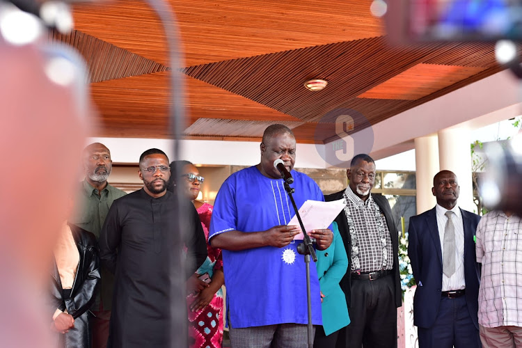 Former Basic Education and Early Learning Principal Secretary Julius Jwan addressing the media on funeral arrangements of the late George Magoha at the late CS's home in Lavington, Nairobi on February 3, 2023