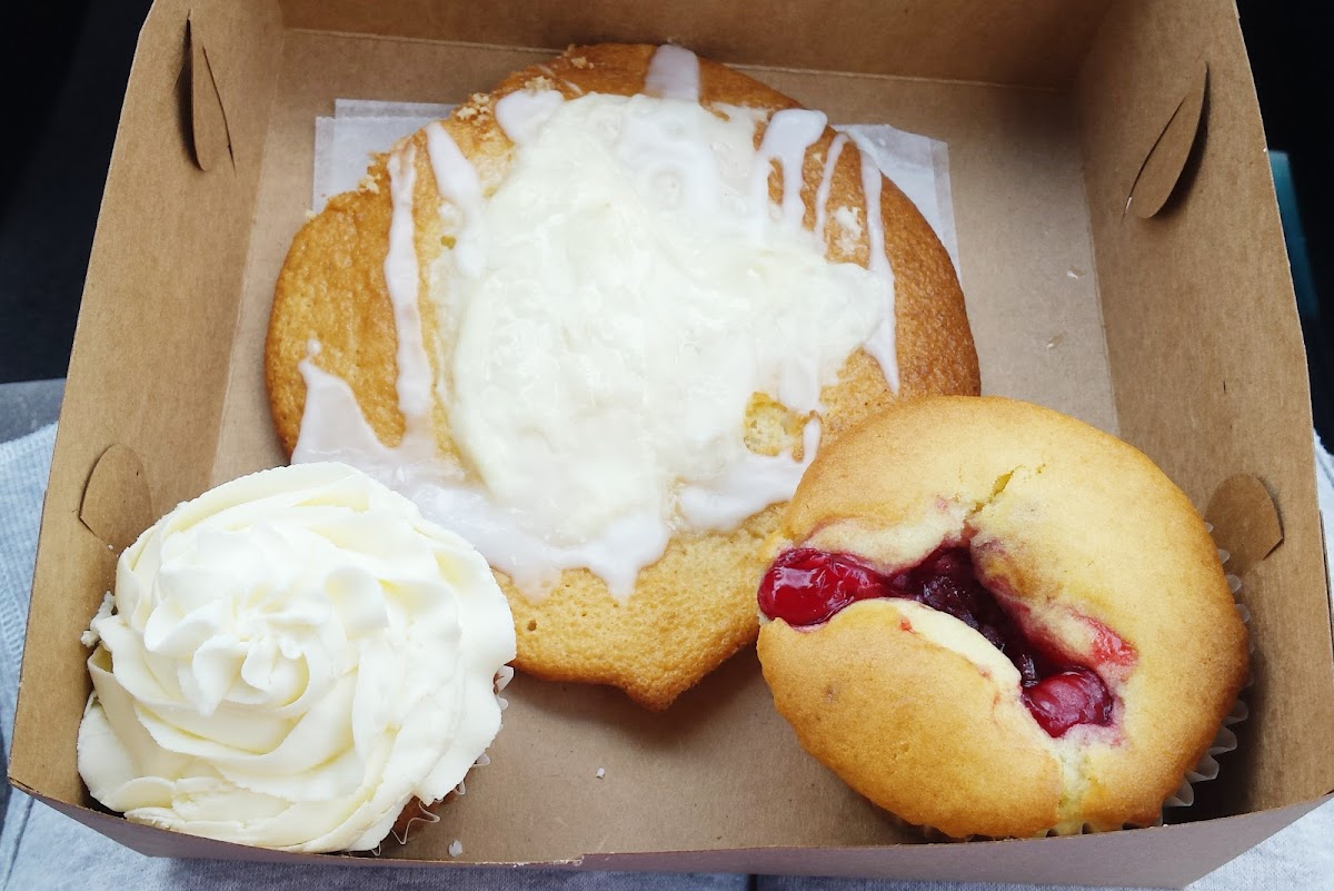 Gluten free vanilla cupcake, cheese danish, and cherry pie muffin.