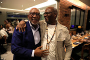 Sipho 'Hotstix' Mabuse with photographer Siphiwe Mhlambi during the birthday celebration for the jazz legend on Tuesday. 