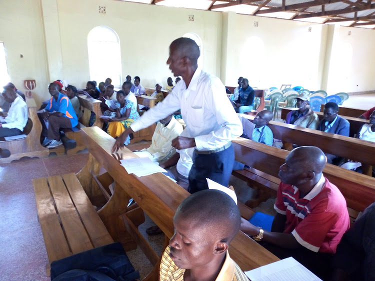 A Siaya resident questions the proposed 2019-2020 budget at Mahaya on Thursday