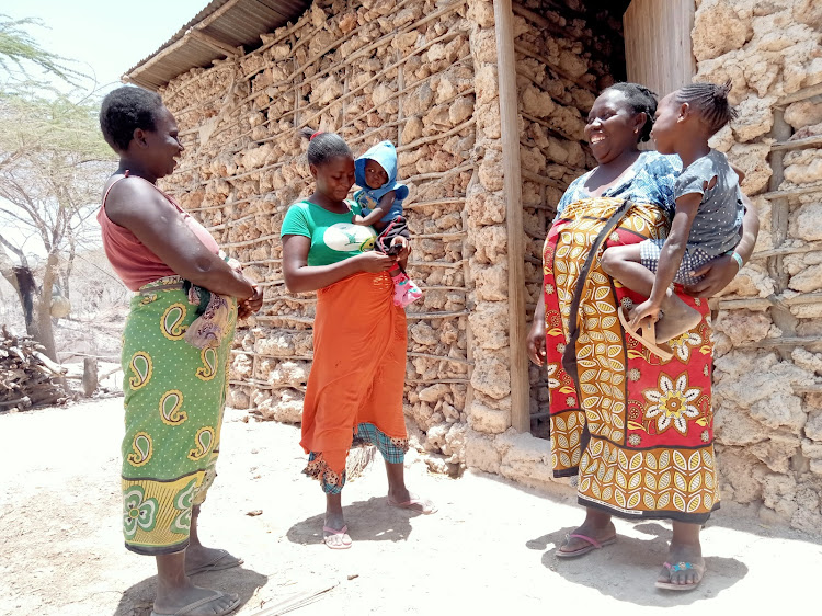 Pregnant women and young children at the Manda village.