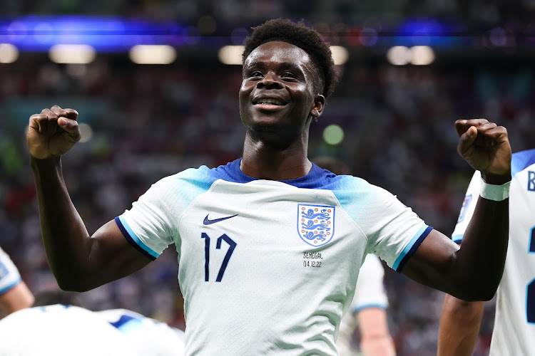 Bukayo Saka of England celebrates after scoring his side's third goal during the FIFA World Cup Qatar 2022 Round of 16 match against Senegal at Al Bayt Stadium on December 4, 2022 in Al Khor