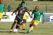 Nkosingiphile Ngcobo of Kaizer Chiefs and Thabani Zuke, captain of Lamontville Golden Arrows, during the DStv Premiership match at Princess Magogo Stadium in Durban on April 27 2022.