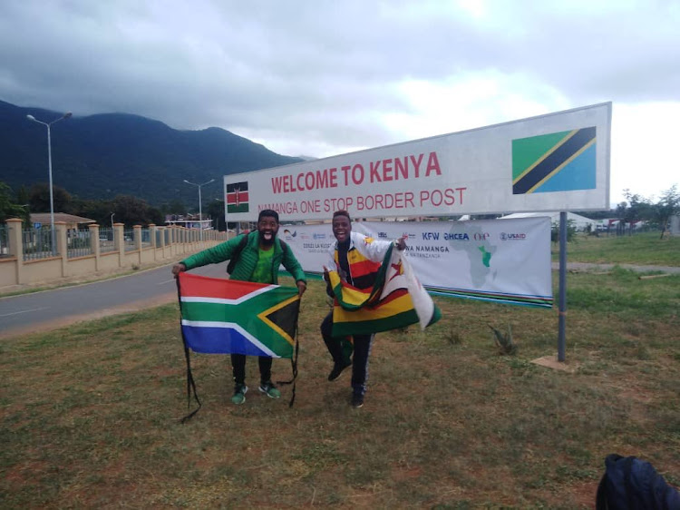 SA football fan Botha Msila and his Zimbabwe counterpart Alvin Zhakata in Kenya in June 2019.