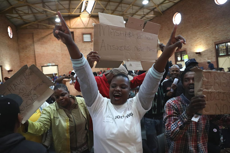 Residents of Alexandra on Monday packed a community hall as they waited for the arrival of Joburg mayor Herman Mashaba.