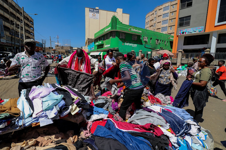 Crowds gather at a linen trader in Gikomba.The market is the ultimate place for secondhand clothes and is popularly known for its aggressive hawking market Nairobi on October 24, 2022.