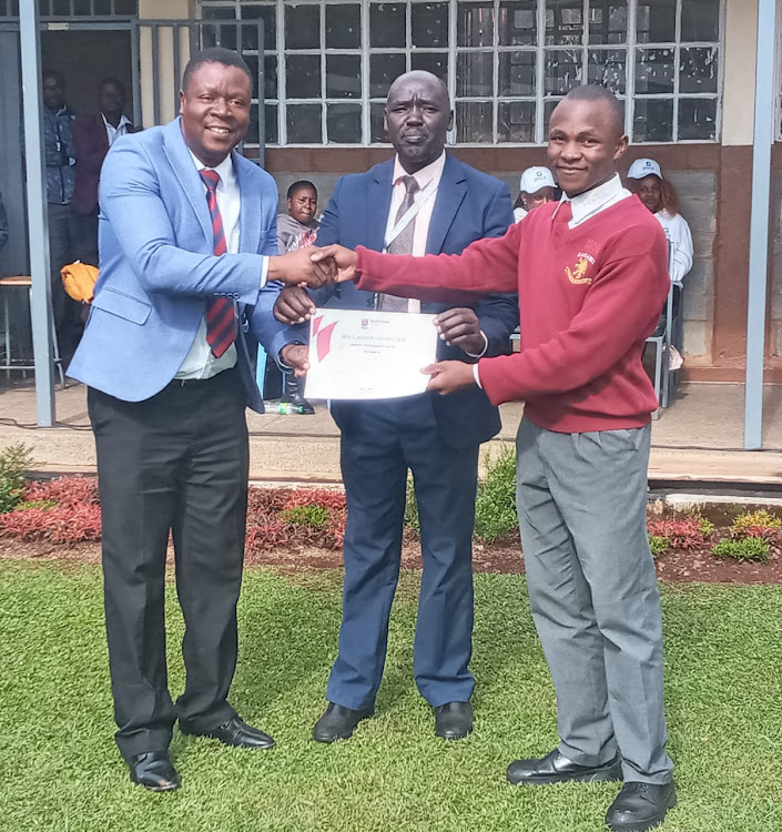 Johnson Musungu is receives academic scholarship from Strathmore University after he topped in a mathematic competition