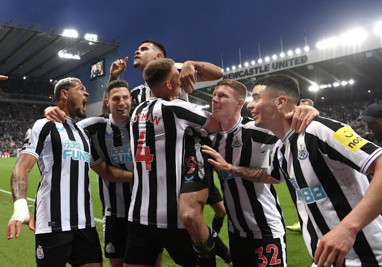 Newcastle players celebrate during a recent match