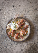 A taste from Table Seven's chef's table: Puglia Burrata, nectarines marinated in a lavender vinaigrette, prosciutto and basil.