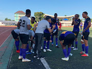 Kaizer Chiefs Italian coach Giovanni Solinas in a discussion with his players during the Caf Confederation Cup preliminary stage second leg match against Zimamoto FC of Zamzibar on Tuesday December 4 2018. 