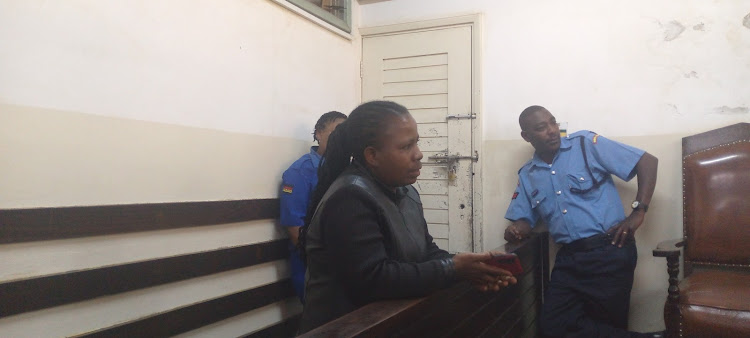 Speraser Kinyua alias Judy in Kibera court where she denied the charges