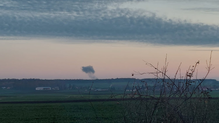 Smoke rises in the distance amid reports of two explosions, seen from Nowosiolk in Poland, near the border with Ukraine on November 15 2022.