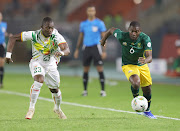 Aubrey Modiba of South Africa is challenged by Aliou Dieng of Mali during their Africa Cup of Nations (Afcon) match at the Amadou Gon Coulibaly Stadium in Korhogo on 16 January 2024.