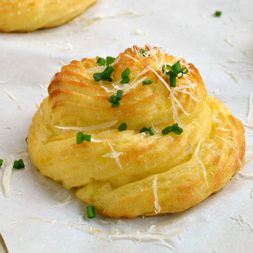 Perfectly proportioned, delicious, pretty and easy these Duchess Potatoes are perfect for your holiday celebrations and dinner parties.  Your guests will so impressed with your elegance.