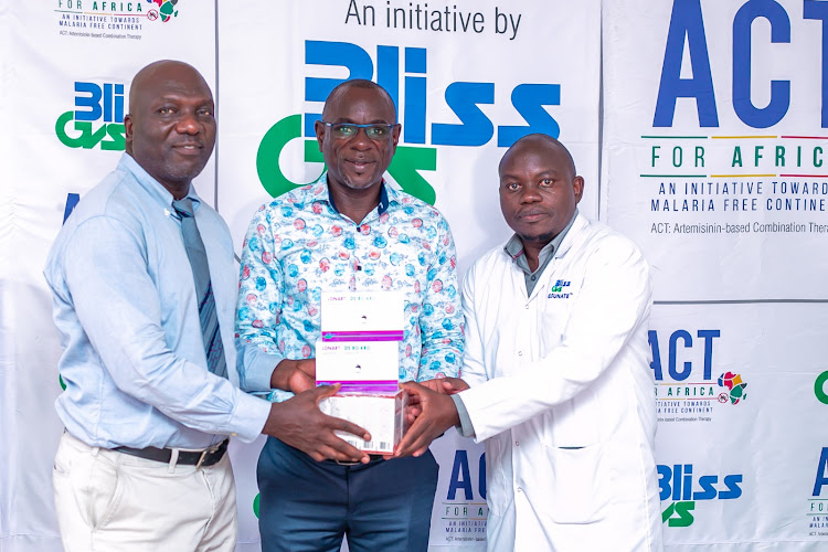 Medical superintendent Kisumu County Referral Hospital Dr Tom Nyangara (L) receiving antimalarial donation from Bliss GVS Pharma regional representative Romeo Pilkington in April 2023