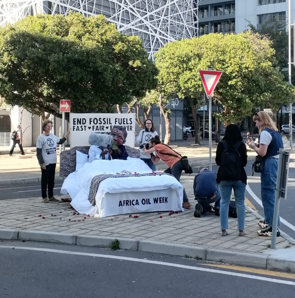 Environmental activists protest outside the Cape Town International Convention Centre during Africa Oil and Gas Week.